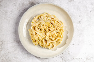 Delicious fettuccine pasta with white cheese sauce. Fettuccine pasta with Alfredo sauce.