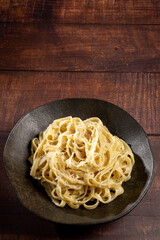 Delicious fettuccine pasta with white cheese sauce. Fettuccine pasta with Alfredo sauce.