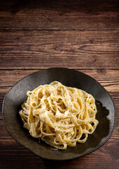 Delicious fettuccine pasta with white cheese sauce. Fettuccine pasta with Alfredo sauce.