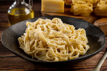 Delicious fettuccine pasta with white cheese sauce. Fettuccine pasta with Alfredo sauce.