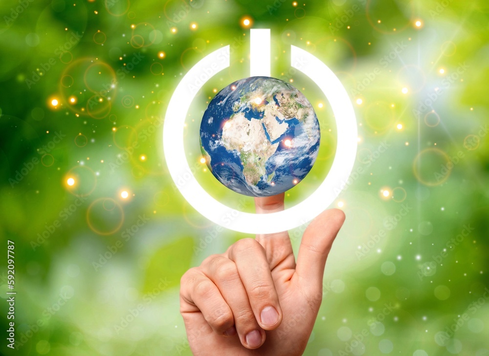 Wall mural globe of earth with image of power button in hand