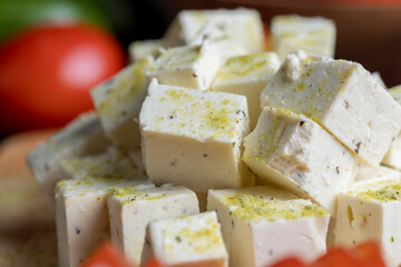 sliced white cottage cheese with spices