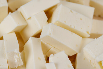 sliced soft cheese that is used for salads