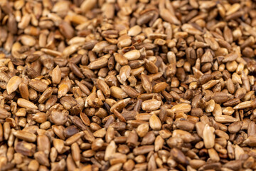 heavily fried sunflower seeds close up