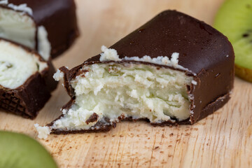 sweet green cottage cheese with kiwi flavor in chocolate glaze