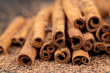 solid aromatic cinnamon on the table in chocolate