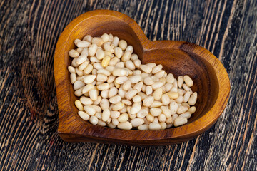 peeled pine nuts close-up on the table