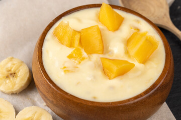 natural yogurt with pieces of fruit and banana flavor