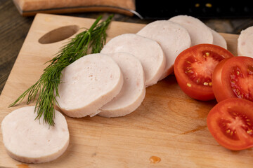 Sliced ripe red tomato on the table