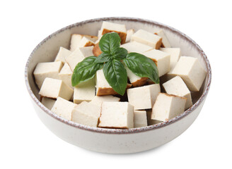 Bowl with delicious smoked tofu and basil on white background