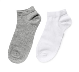 Different socks isolated on white, top view