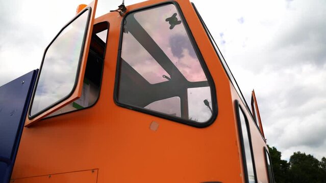 orange control box with a warning light on the roof