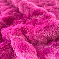 Fototapeta na wymiar Colorful gradient soft faux fur fabric closeup