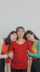 Fototapeta premium Mother's day, woman birthday anniversary, Senior elderly mature asian millennial grandmother with female daughter only women three people twin grand sister and young sister, real family person.