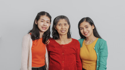 Mother's day, woman birthday anniversary, Senior elderly mature asian millennial grandmother with female daughter only women three people twin grand sister and young sister, real family person.