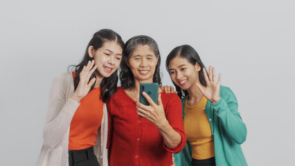 Mother's day, woman birthday anniversary, Senior elderly mature asian millennial grandmother with female daughter only women three people twin grand sister and young sister, real family person.