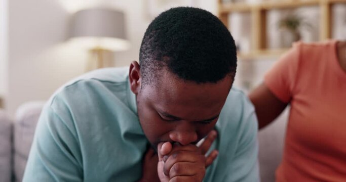 Sick, couple and man coughing in home, flu and cold from covid, chest and breathing problem. Black male, pain and cough of asthma, tuberculosis and sore throat of allergy, lungs and choking in lounge