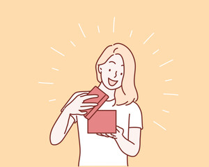 Happy young woman opening a  present box. Hand drawn style vector design illustrations.