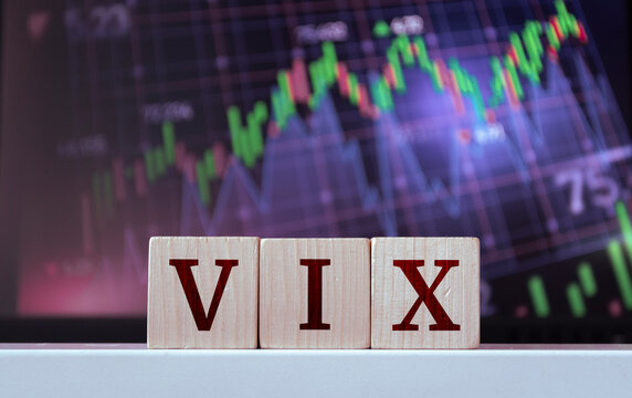 VIX - acronym from wooden blocks with letters, Volatility index. Financial market concept