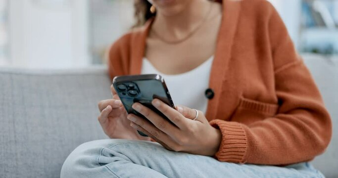 Scrolling, hands and a woman with a phone on the sofa for communication and social media. Relax, internet and a girl typing on a mobile app for an email, text message or checking a notification