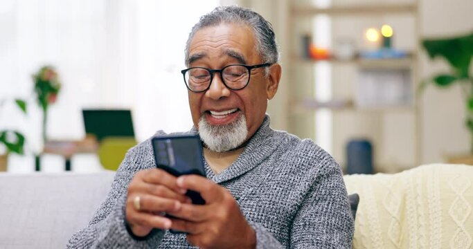 Relax, phone and laugh with old man on sofa for text message, social media and streaming. Technology, happy and communication with senior male in living room at home for website, chat and internet