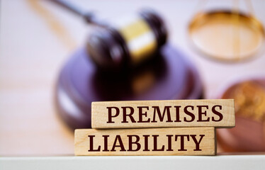 Wooden blocks with words 'Premises liability'.