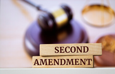 Wooden blocks with words 'Second Amendment'. Legal concept