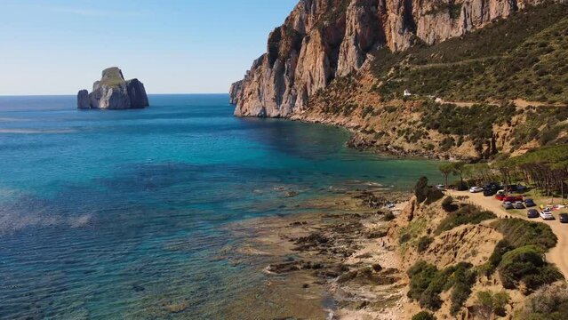 4k aerial view of Masua beach coast in South Sardinia, summer, sunny day