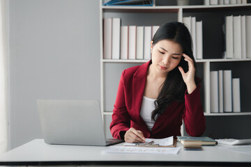 Businesswoman stress at work, young Asian business women as business executives, founding and running start-up executives, young female business leaders. Startup business concept.