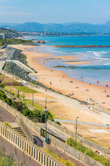 Pathway leading to the Cote des Basques beach in Biarritz, France on a summer day