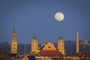 full moon over the old city hall of augsburg germany