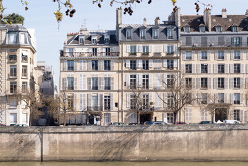 Parisian buildings exterior located around seine river. 
