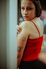 Close up of the client looking at the tattoo place