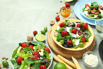 Concept of tasty food, salad with strawberry, space for text