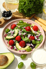 Concept of tasty food, salad with strawberry