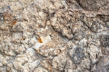 Background of stone wall texture. Close-up of stone surface.