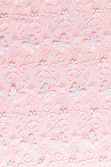 Beautiful delicate lace of white flowers and butterflies on a pink background. wedding background. layout for design. vertical background