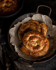 Salt pie in a pan, traditional baked food, rustic viewb
