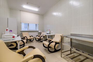 relaxation room with chairs and exercise equipment in office for rest and relax of staff