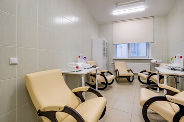 relaxation room with chairs and exercise equipment in office for rest and relax of staff