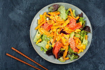 Asian salad with salmon.