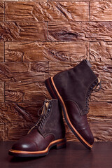 Dark Brown Grain Brogue Derby Boots Made of Calf Leather with Rubber Sole Placed Over Grunge...