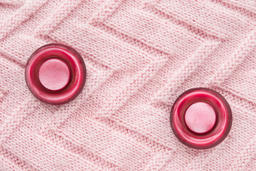 Buttons on knit fabric