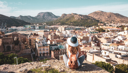 Woman tourist visiting Cartagena city landscape in Spain © M.studio