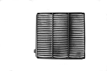 Dirty car air filter, isolated on white background