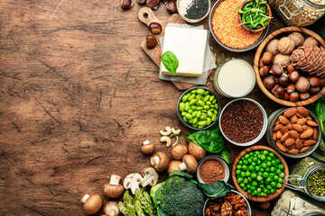 Vegan protein food background. Full set of plant based vegetarian food sources. Healthy eating, diet ingredients: legumes, beans, nuts, soy and almond milk, tofu, quinoa, vegetables, seeds and sprouts