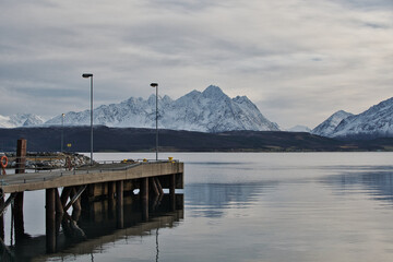 Breivikeidet Fergekai, Norway. Breivikeidet ferry dock in Norway - Fjord and mountains.