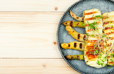 White asparagus with halloumi cheese.