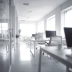 Blur focus of White open space office interior can be used as background, blurred office modern interior workplace design white. business concept