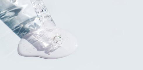 pipette drop of serum test on a light background